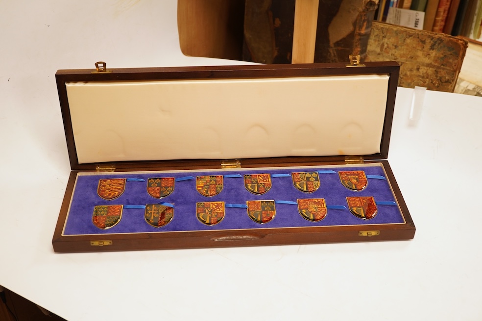 Yorkshire Mint 'Royal Arms Collection' of 12 enamelled silver armorial shields, cased and Westminster Mint 12 QEII Falkland Islands Golden Jubilee proof silver coins, cased (2 cases)